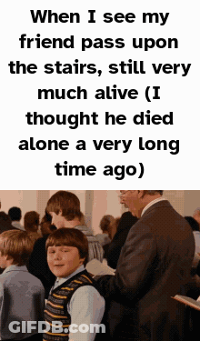 A Man In A Suit Is Talking To A Boy In A Crowd GIF