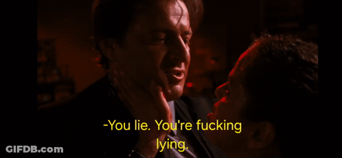 A Man In A Suit Is Talking To Another Man In A Dark Room With The Words - You Lie You 'Re Fucking Lying GIF