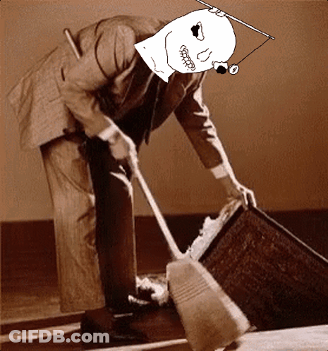 A Man In A Suit Is Using A Broom To Clean A Floor GIF