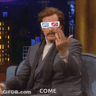 A Man In A Suit Is Wearing 3D Glasses And Giving The Middle Finger . GIF