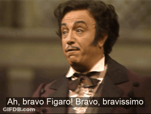 A Man In A Suit Says Ah Bravo Figaro Bravo Bravissimo GIF