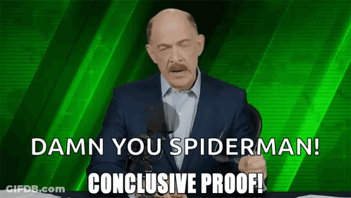 A Man In A Suit Says " Damn You Spiderman " On A Green Background GIF