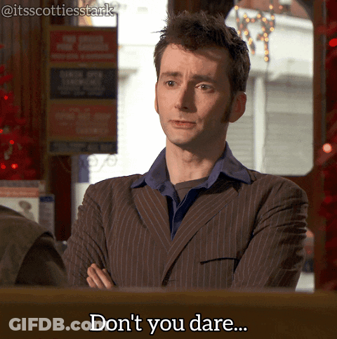 A Man In A Suit Says " Don T You Dare " GIF