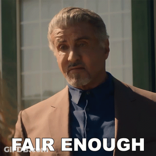A Man In A Suit Says Fair Enough GIF