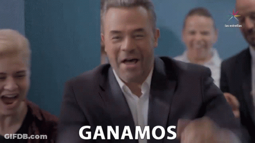 A Man In A Suit Says Ganamos In Spanish GIF