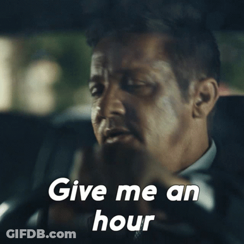 A Man In A Suit Says Give Me An Hour While Sitting In A Car GIF