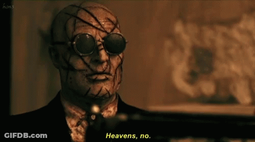 A Man In A Suit Says Heavens No GIF