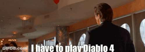 A Man In A Suit Says I Have To Play Diablo 4 In A Restaurant GIF