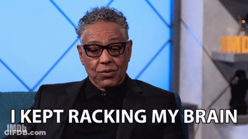 A Man In A Suit Says I Kept Racking My Brain GIF