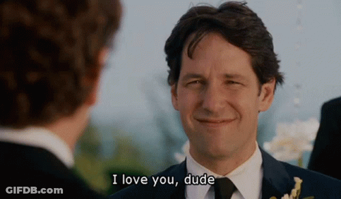 A Man In A Suit Says I Love You Dude To Another Man GIF