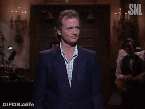 A Man In A Suit Says I 'M Frightened In Front Of A Crowd GIF