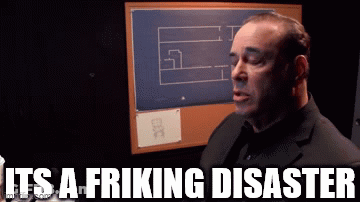 A Man In A Suit Says It 'S A Fricking Disaster In Front Of A Bulletin Board GIF