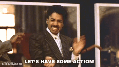 A Man In A Suit Says Let 'S Have Some Action While Dancing GIF