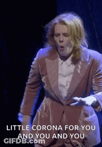 A Man In A Suit Says " Little Corona For You And You And You " GIF