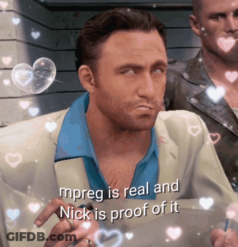 A Man In A Suit Says Mpreg Is Real And Nick Is Proof Of It With Hearts Around Him GIF
