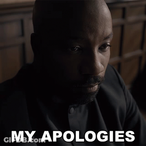 Man In Suit Saying My Apologies GIF