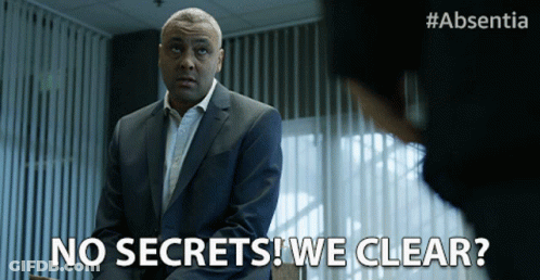 A Man In A Suit Says No Secrets We Clear In Front Of A Woman GIF