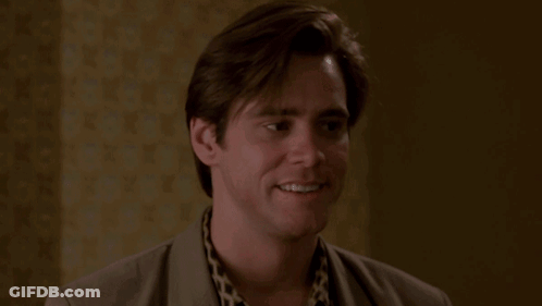 A Man In A Suit Says Nothing In A Room GIF
