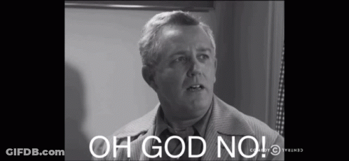 A Man In A Suit Says Oh God No GIF