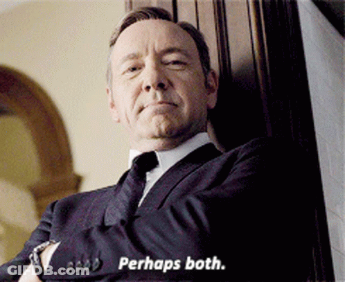 A Man In A Suit Says Perhaps Both GIF