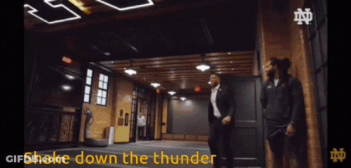A Man In A Suit Says Shake Down The Thunder In A Video GIF