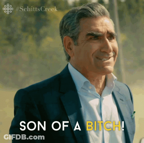 A Man In A Suit Says Son Of A Bitch In Yellow Letters GIF