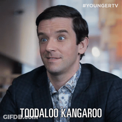 A Man In A Suit Says " Toodaloo Kangaroo " On A Screen GIF
