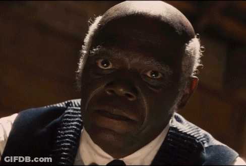 A Man In A Suit Says Until Your Back Give Out On His Face GIF