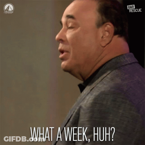 A Man In A Suit Says " What A Week Huh ? " GIF