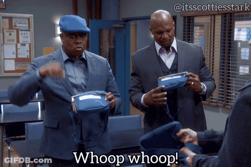 A Man In A Suit Says Whoop Whoop In A Classroom GIF