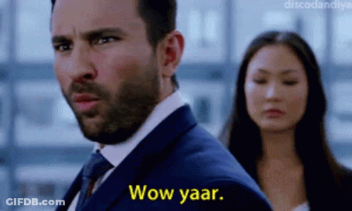 A Man In A Suit Says Wow Yaar While Standing Next To A Woman GIF