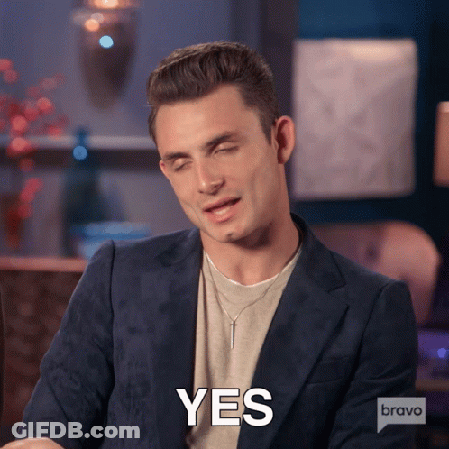 A Man In A Suit Says Yes On Bravo Tv GIF
