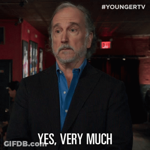Man In Suit Says Yes Very Much GIF