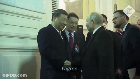A Man In A Suit Shakes Hands With Another Man In A Suit And Tie With The Caption I Agree GIF