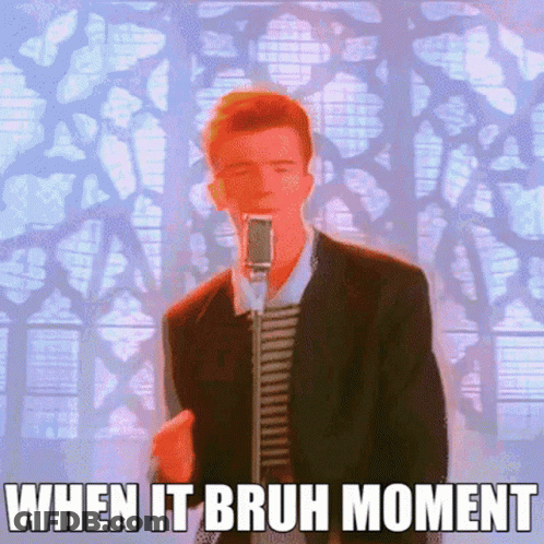 A Man In A Suit Singing Into A Microphone With The Words When It Bruh Moment Below Him GIF