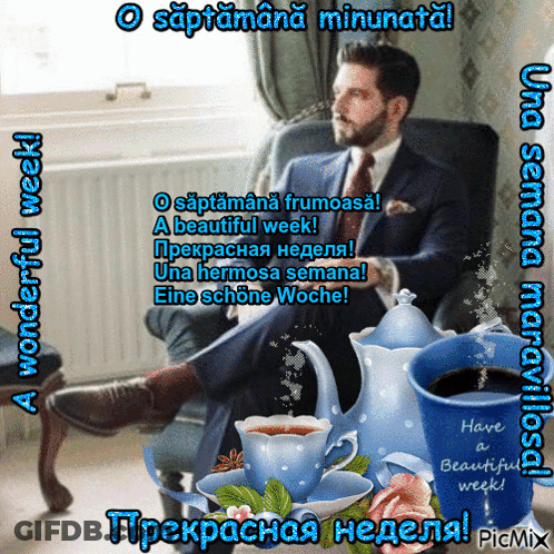 A Man In A Suit Sits In A Chair With His Feet Up Next To A Cup Of Coffee GIF