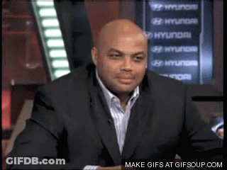 A Man In A Suit Sitting In Front Of A Hyundai Sign GIF