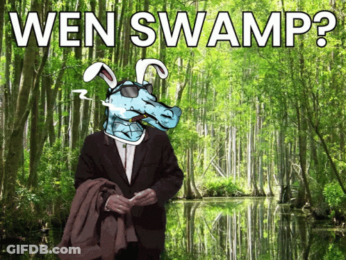 A Man In A Suit Smoking A Cigarette In Front Of A Swamp And The Words Wen Swamp GIF