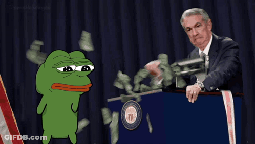 A Man In A Suit Stands Behind A Podium With A Frog In Front Of Him That Says ' Fed ' On It GIF