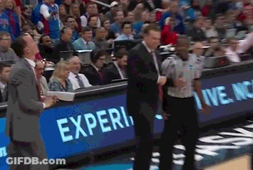 A Man In A Suit Stands In Front Of A Blue Sign That Says Experi GIF