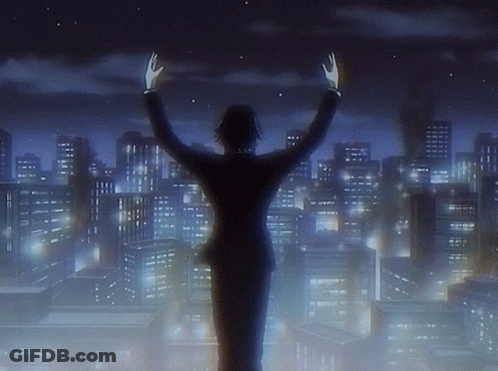A Man In A Suit Stands In Front Of A City Skyline With His Hands In The Air GIF