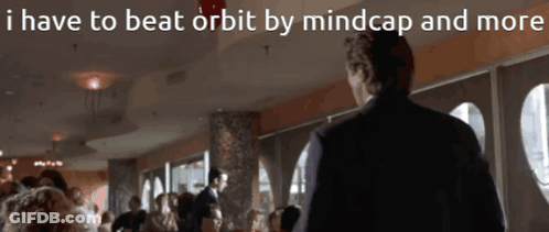 A Man In A Suit Stands In Front Of A Crowd Of People With The Words I Have To Beat Orbit By Mindcap And More GIF