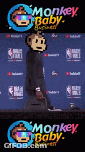 A Man In A Suit Stands In Front Of A Monkey Baby Business Logo GIF