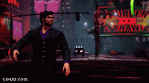 A Man In A Suit Stands In Front Of A Neon Sign That Says I Don T Make Threats GIF