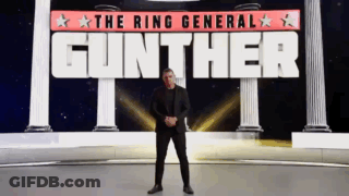 A Man In A Suit Stands In Front Of A Sign That Says Gunther GIF
