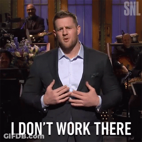 A Man In A Suit Stands In Front Of An Orchestra And Says " I Don 'T Work There " GIF