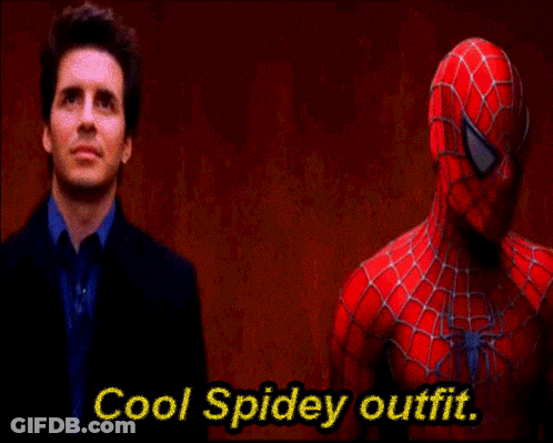 A Man In A Suit Stands Next To A Spiderman And The Words Cool Spidey Outfit Are Visible GIF