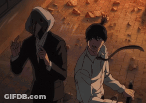 A Man In A Suit Stands Next To Another Man In A White Shirt GIF
