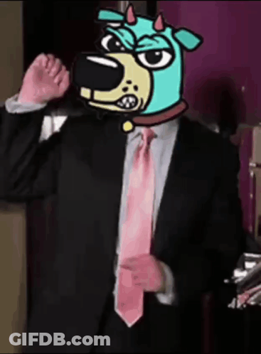 A Man In A Suit With A Dog Head On His Head GIF