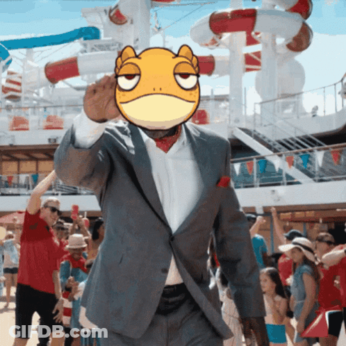 A Man In A Suit With A Frog On His Head GIF